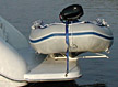 Pull on, roll on, slide on davits and davit systems for inflatable boats and dinghies.
